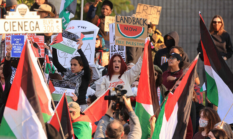 Protesters rally during the &ldquo;Black &amp; Palestinian Solidarity for a Ceasefire this Xmas&rdquo; by the Beverly Center shopping centre in Los Angeles on December 23, 2023.&mdash;AFP