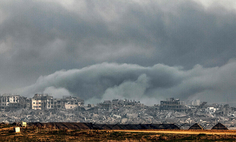 Smoke billows over the northern Gaza Strip during Israeli bombardment from southern Israel on December 27, 2023. &mdash; AFP