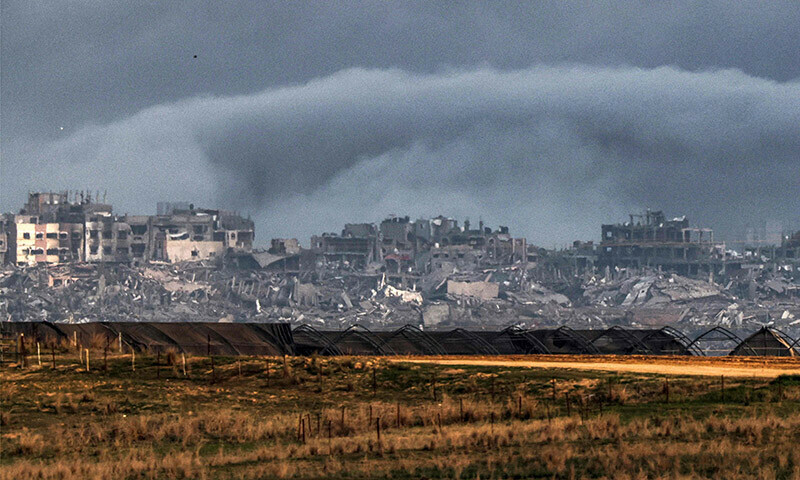 Smoke billows over the northern Gaza Strip during Israeli bombardment from southern Israel on December 27, 2023. &mdash; AFP
