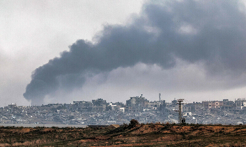 Smoke billows over the northern Gaza Strip during Israeli bombardment from southern Israel on December 27, 2023. &mdash; AFP