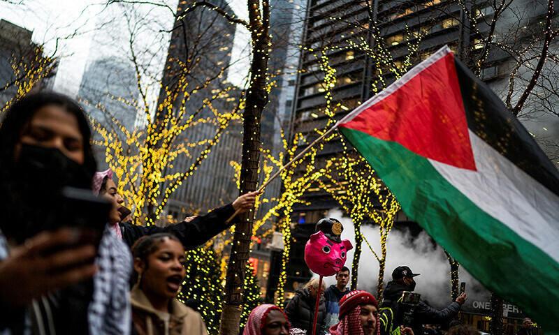 Pro-Palestinian demonstrators gather around Zuccotti Park demanding a ceasefire&nbsp;during a protest in New York City, US on December 28, 2023 &mdash; Reuters