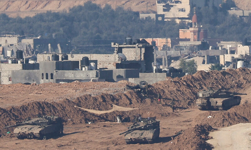 Israeli army tanks manoeuvre in Gaza on December 30, 2023. &mdash; Reuters