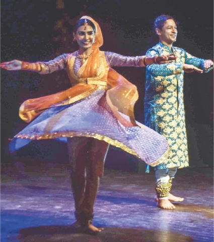 Sheema Kermani&rsquo;s dance students Tabita Simrin Bhatti and Muhammad Asif tell the story of Kathak dancer Parveen Qasim and her father and dance teacher Muhammad Qasim during the event on Friday. &mdash; Fahim Siddiqi / White Star