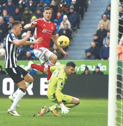 NEWCASTLE: Nottingham Forest&rsquo;s Chris Wood (C) scores during the Premier League match against Newcastle United at St James&rsquo; Park on Tuesday.&mdash;Reuters