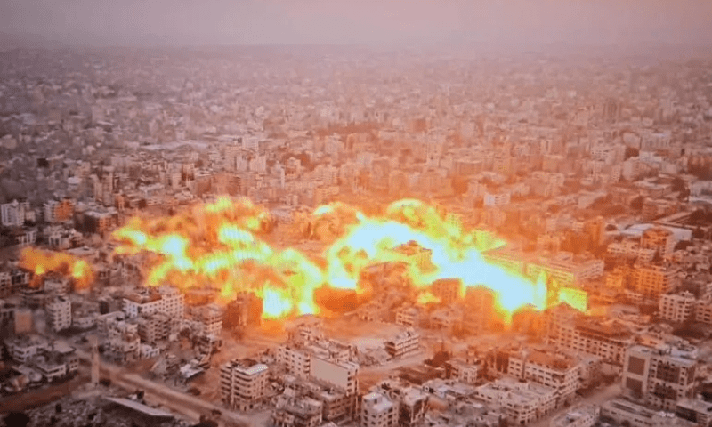 The Palestine Mosque Square neighbourhood in Gaza City, where the author lived, under Israeli bombardment &mdash; Maram Humaid/Al Jazeera