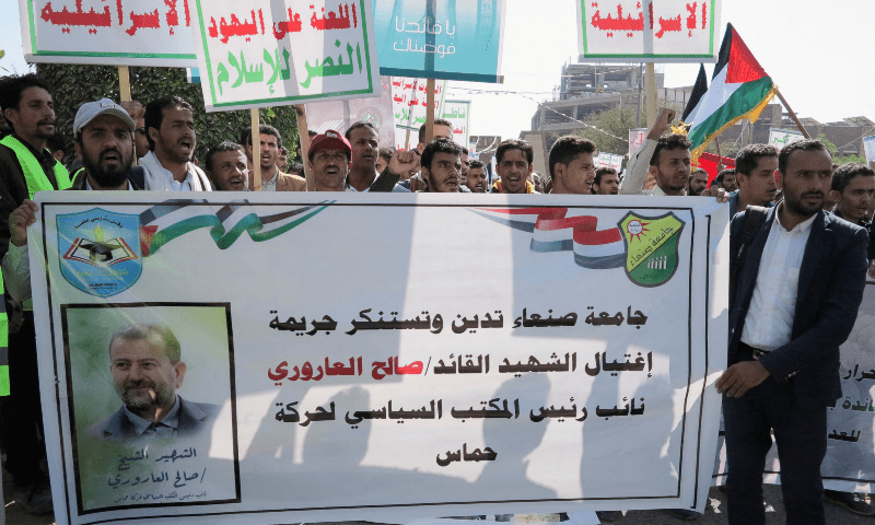  University students carry a banner denouncing the killing of Hamas deputy leader Saleh al-Arouri during a pro-Palestinian protest in Sanaa, Yemen on Jan 3, 2024. &mdash; Reuters 