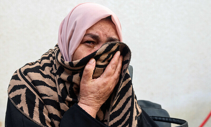 A woman mourns loved ones killed during Israeli bombardment as they lie outside al-Najjar hospital in Rafah in the southern Gaza Strip on January 5. &mdash; AFP