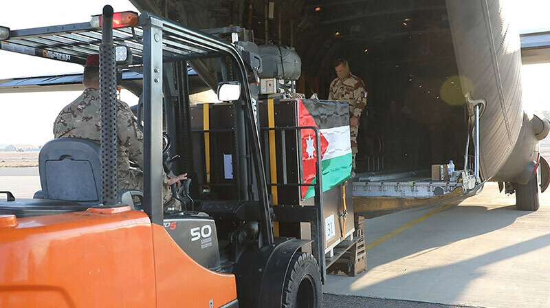 French-Jordanian humanitarian aid is being loaded into a military cargo plane at an undisclosed location in Jordan before being airdropped over Khan Yunis and a Jordanian field hospital in the Gaza Strip. &mdash; AFP
