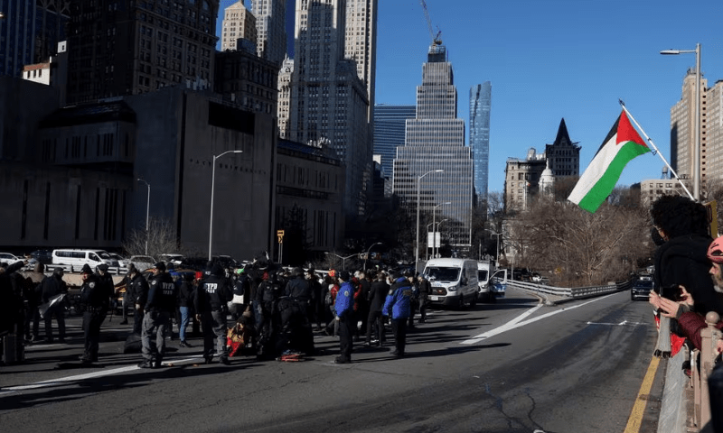 Pro-Palestinian demonstrators are taken into custody by the NYPD after blocking a Brooklyn Bridge roadway during a &lsquo;Shut it Down for Palestine&rsquo; protest in New York City, USA, on January 8, 2024. &mdash; Reuters