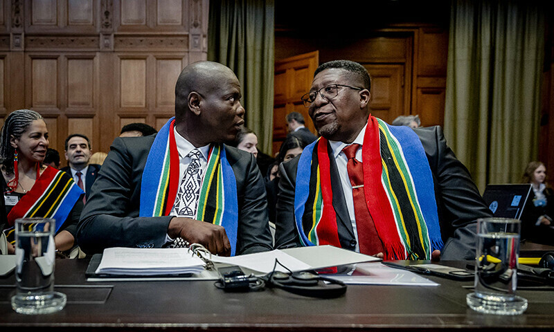 South Africa Minister of Justice Ronald Lamola and South African Ambassador to the Netherlands Vusimuzi Madonsela attend the International Court of Justice (ICJ) ahead of the hearing of the genocide case against Israel brought by South Africa, in The Hague on January 11, 2024 &mdash; AFP.