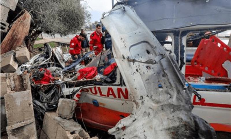 Palestinian Red Crescent personnel check a destroyed ambulance in Deir el-Balah in the central Gaza Strip, on January 11, 2024. &mdash; AFP