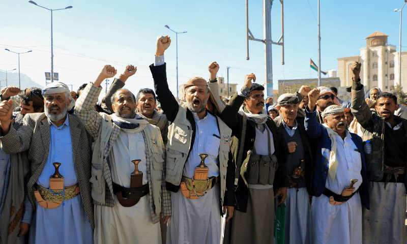  Yemeni supporters of the Houthis shout anti-Israel and anti-US slogans during a march in solidarity with the Palestinian people in Sanaa on Jan 11, 2024. &mdash; AFP 