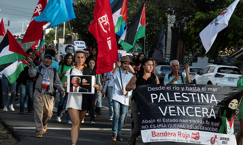 People hold a demonstration in front of the US embassy in solidarity with the people of Gaza and to protest the US&rsquo; support to Israel, in San Jose, Costa Rica, on January 16. &mdash; AFP