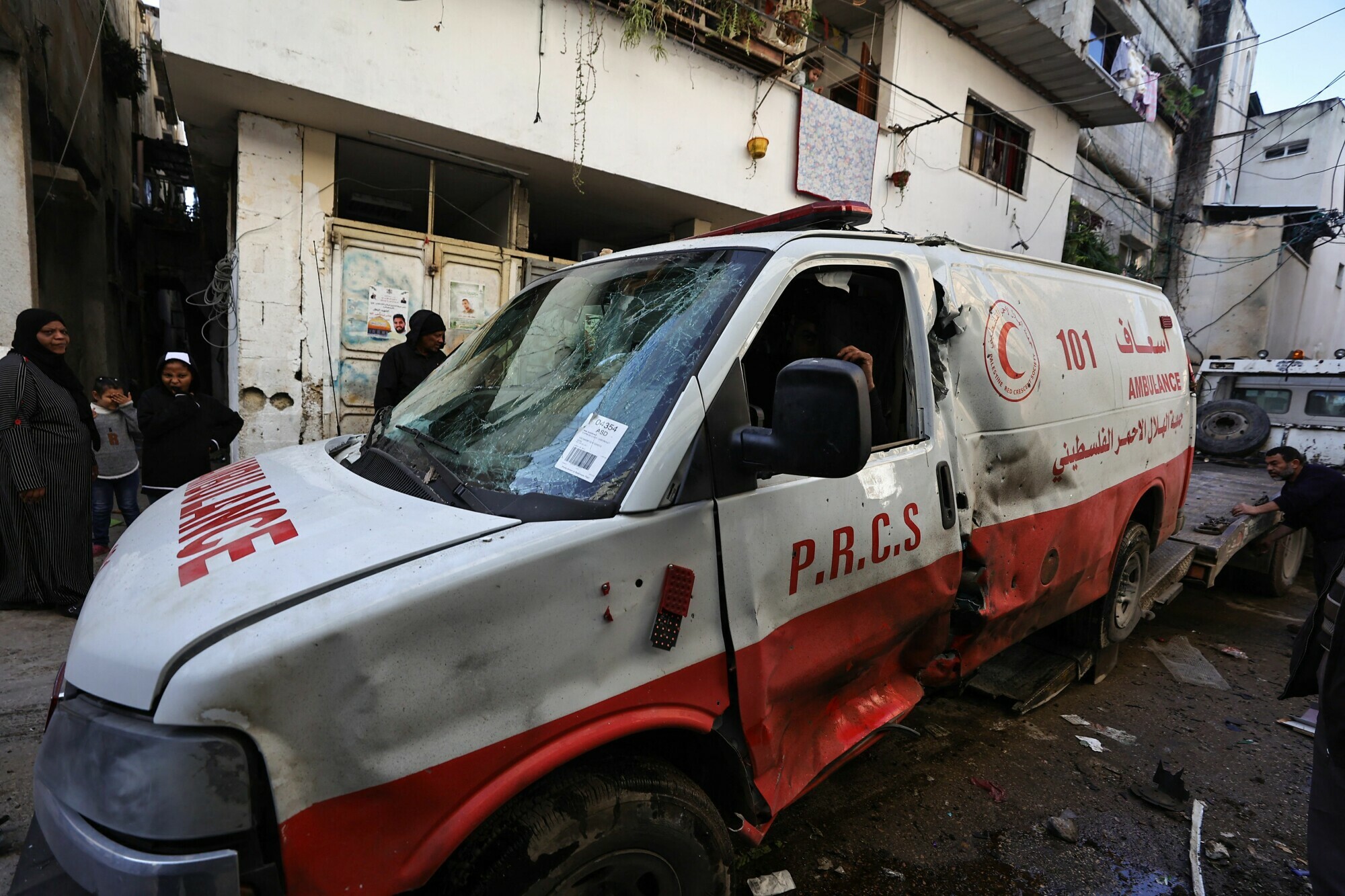 This photograph taken on January 19, 2024 in the occupied West Bank shows a damaged ambulance in a refugee camp in Tulkarem, where the Israeli army carried out overnight raids. &mdash; AFP