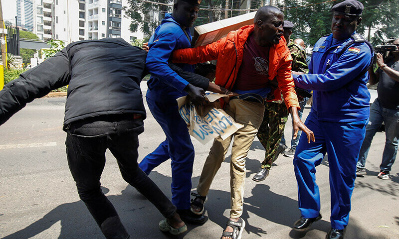 A protestor is detained by the police while attending a demonstration in support of Palestinians in Gaza, in Nairobi, Kenya on January 25. &mdash; Reuters
