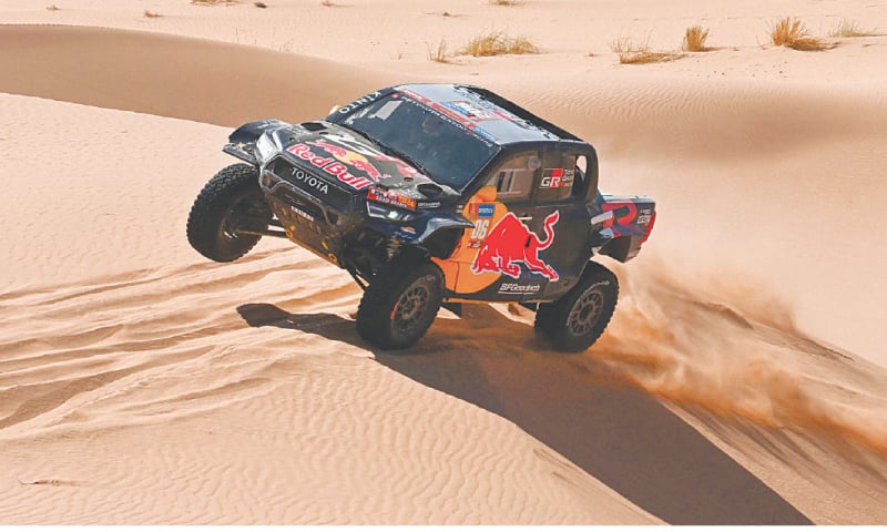 TOYOTA Gazoo Racing’s Brazilian driver Lucas Moraes and his Spanish co-driver Armand Monleon compete during the third stage of the Dakar Rally, between Al Duwadimi and Al Salamiya, on Monday.—AFP TOYOTA Gazoo Racing’s Brazilian driver Lucas Moraes and his Spanish co-driver Armand Monleon compete during the third stage of the Dakar Rally, between Al Duwadimi and Al Salamiya, on Monday.—AFP