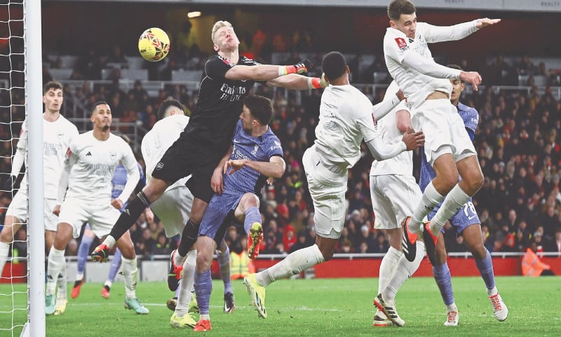 Arsenal’s Jakub Kiwior (R) scores an own goal during the FA Cup third-round match against Liverpool at the Emirates Stadium.—Reuters Arsenal’s Jakub Kiwior (R) scores an own goal during the FA Cup third-round match against Liverpool at the Emirates Stadium.—Reuters