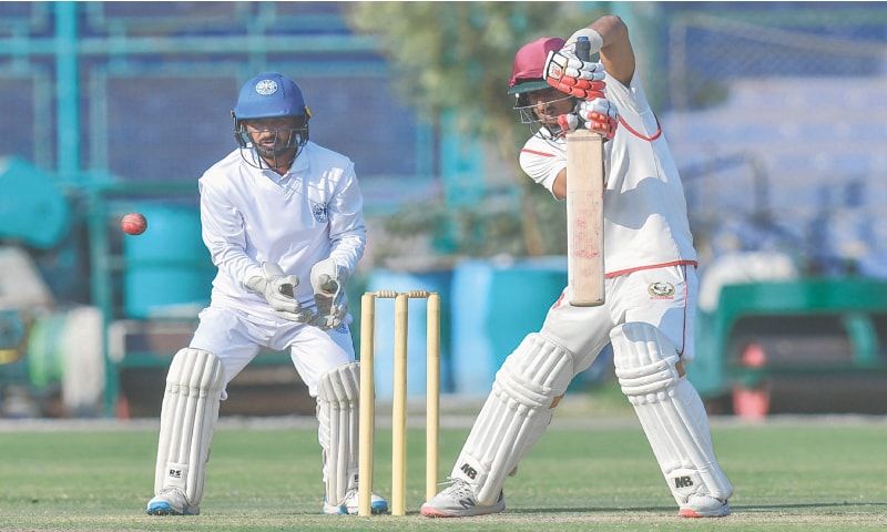 KARACHI: KRL batter Rohail Nazir plays a shot as SBP wicket-keeper Ali Shan looks on during the President’s Trophy fifth-round match at the National Bank Stadium on Tuesday.—courtesy PCB KARACHI: KRL batter Rohail Nazir plays a shot as SBP wicket-keeper Ali Shan looks on during the President’s Trophy fifth-round match at the National Bank Stadium on Tuesday.—courtesy PCB