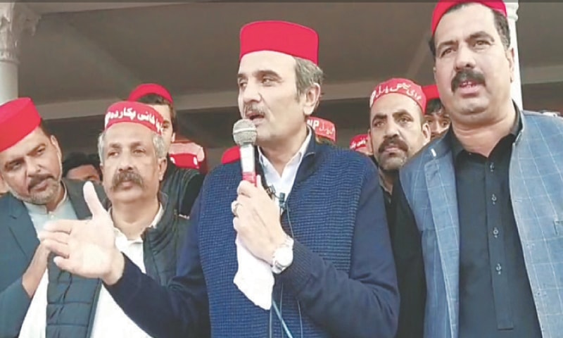 Ameer Haider Hoti addresses a public meeting in Swabi on Monday. &mdash; Dawn