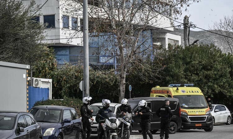 Nearby roads were closed and a large police presence surrounded the company building. — AFP Nearby roads were closed and a large police presence surrounded the company building. — AFP