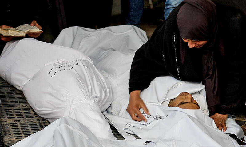 A mourner reacts next to the bodies of Palestinians killed in Israeli strikes at Abu Yousef Al-Najjar hospital in Rafah, in the southern Gaza Strip, February 18.&mdash; Reuters
