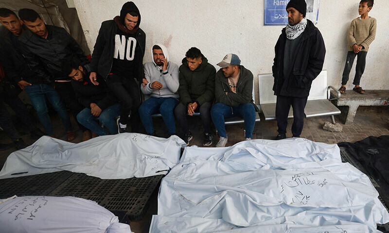 Palestinians gather to identify the bodies of relatives Rafah&rsquo;s Al-Najjar hospital on February 18. &mdash;AFP