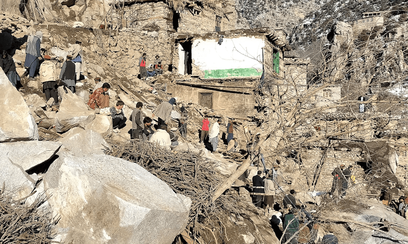 Villagers and rescue personnel search for survivors amid debris in a mountainside at Nakre village in the Dara Tateen area of Noorgram district in Nuristan province on February 20, 2024, after a heavy snowfall triggered a landslide. &mdash; AFP