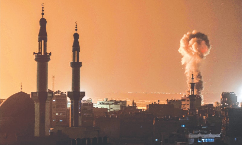 Smoke billows during Israeli bombardment in Rafah, in the southern Gaza Strip, on Tuesday.—AFP Smoke billows during Israeli bombardment in Rafah, in the southern Gaza Strip, on Tuesday.—AFP