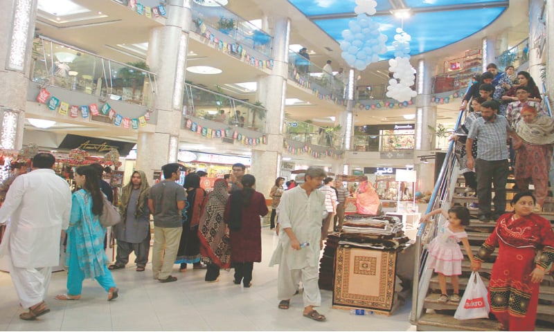 The usual hustle and bustle in a city shopping mall.—White Star /file The usual hustle and bustle in a city shopping mall.—White Star /file