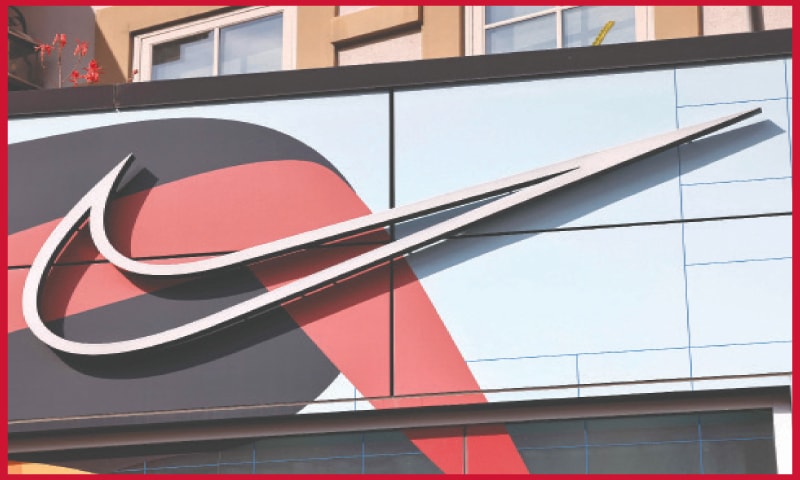 THE Nike logo is displayed at a Nike Well Collective store. Nike announced it would be laying off 2 per cent of its workforce worldwide, close to 1,700 employees.&mdash;AFP
