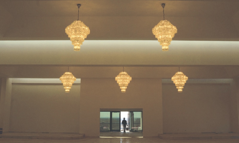 A cleaner works at the new &lsquo;Ibrahim Al-Khalil&rsquo; church.&mdash;Reuters