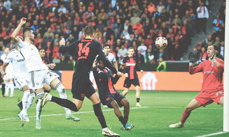 LEVERKUSEN: Patrik Schick (C) of Bayer Leverkusen heads the winner against Qarabag during their Europa League round-of-16 second leg at BayArena.—Reuters LEVERKUSEN: Patrik Schick (C) of Bayer Leverkusen heads the winner against Qarabag during their Europa League round-of-16 second leg at BayArena.—Reuters