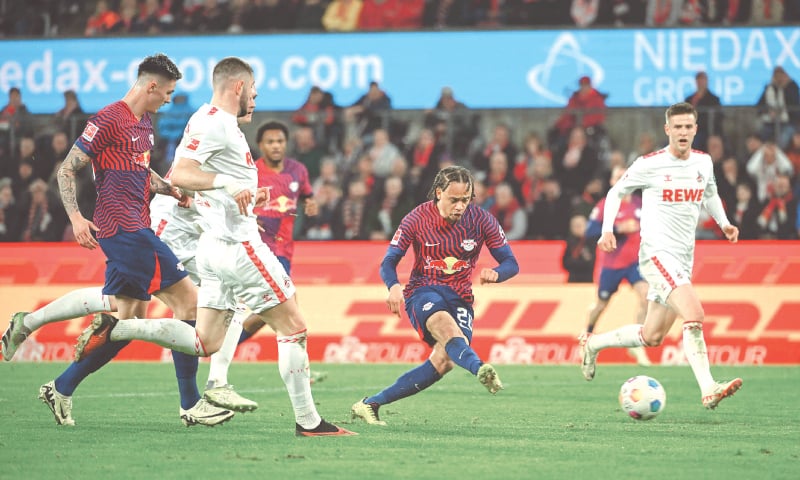 COLOGNE: RB Leipzig&rsquo;s Xavi Simons (second R) shoots to score during the Bundesliga match against FC Cologne.&mdash;AFP