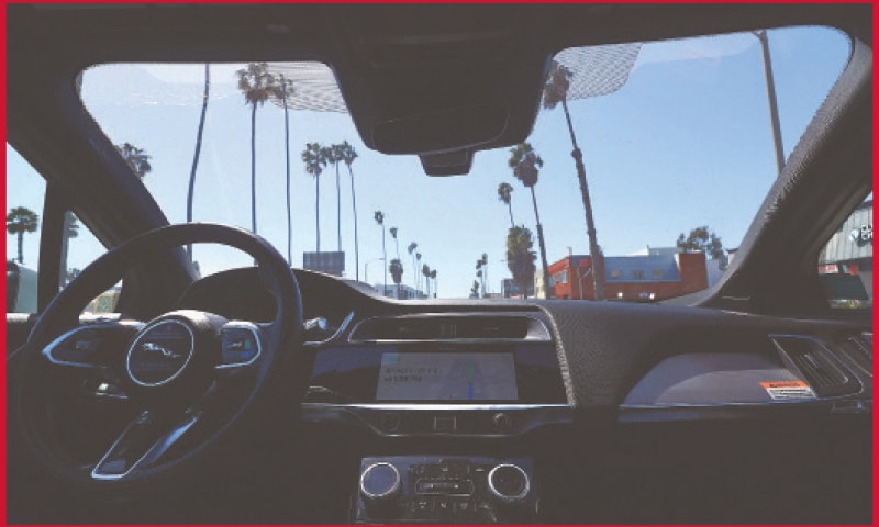 A Waymo autonomous self-driving Jaguar taxi drives along a street in Santa Monica, California. Beginning today, Waymo One is offering robotaxi services in a 63-square mile area of greater Los Angeles, including Santa Monica, Venice and downtown, with over 50,000 people on the waitlist. Waymo is owned by Alphabet, Google’s parent company.—AFP A Waymo autonomous self-driving Jaguar taxi drives along a street in Santa Monica, California. Beginning today, Waymo One is offering robotaxi services in a 63-square mile area of greater Los Angeles, including Santa Monica, Venice and downtown, with over 50,000 people on the waitlist. Waymo is owned by Alphabet, Google’s parent company.—AFP