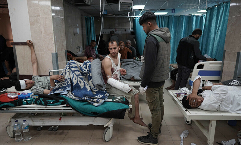 Injured Palestinians receive treatment at the Shuhada Al Aqsa Hospital in Deir el-Balah in the central Gaza Strip on April 3. &mdash; AFP