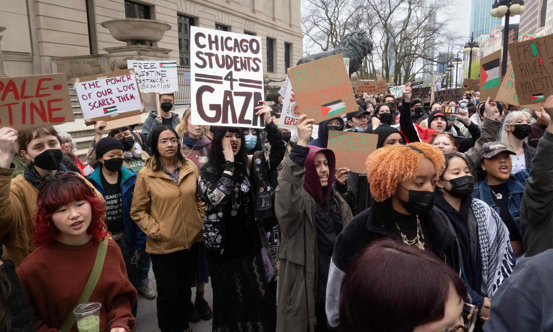  Students and faculty members from the School of the Art Institute of Chicago, Roosevelt College and Columbia College rally and march to show support for the Palestinian people in Gaza on April 26 in Chicago, Illinois. &mdash; AFP 