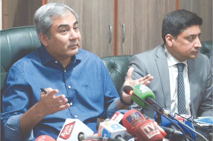 Interior Minister Mohsin Naqvi addresses a presser at the FIA office, on Monday.—Murtaza Ali / White Star