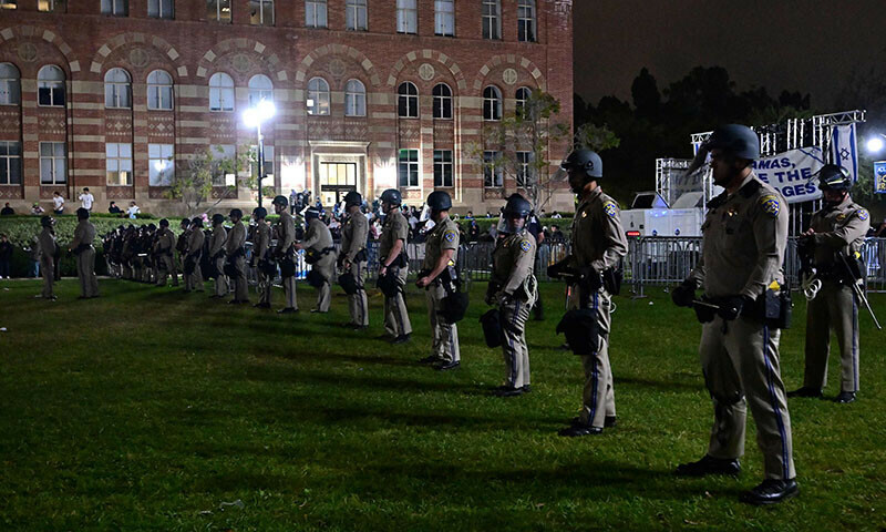US police stand guard as clashes erupt on the campus of the University of California Los Angeles (UCLA) May 1. &mdash; AFP