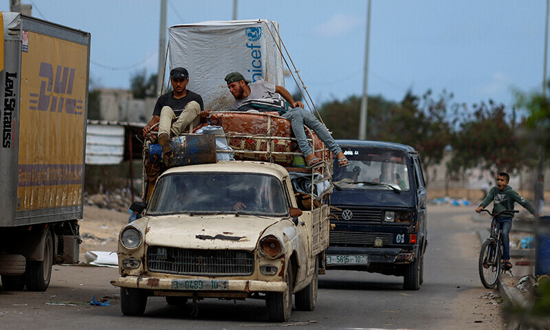 Palestinians ride on a vehicle as they flee Rafah after Israeli forces launched a ground and air operation in the eastern part of the southern Gaza City in the southern Gaza Strip May 13. &mdash; Reuters