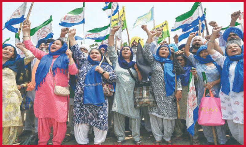 Farmers shout slogans against India&rsquo;s Prime Minister and leader of the ruling BJP Narendra Modi, during a protest to demand minimum crop prices on the outskirts of Gurdaspur last week.&mdash;AFP