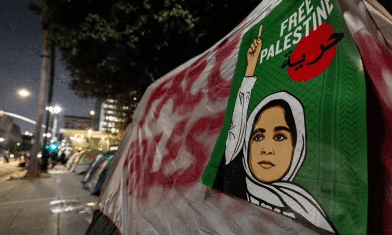 A poster displayed on a tent reads &lsquo;Free Palestine&rsquo; as pro-Palestinian demonstrators set up an encampment outside City Hall in downtown Los Angeles. &mdash; AFP 