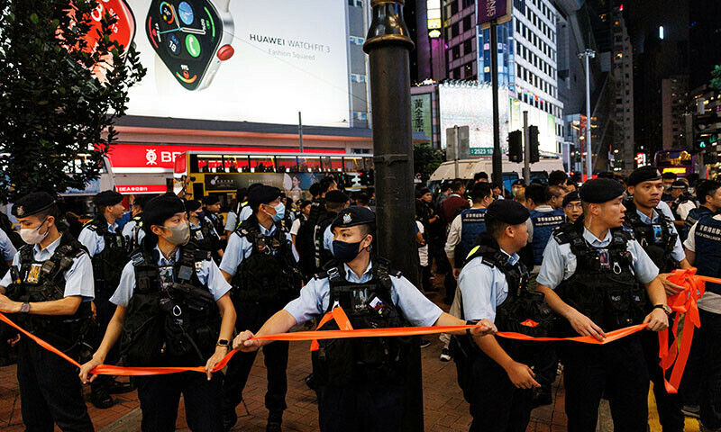 Police form a cordon at Causeway Bay, near where a candlelight vigil is usually held on the 35th anniversary of the crackdown on demonstrators at Beijing&rsquo;s Tiananmen Square in 1989, in Hong Kong, on June 4. &mdash; Reuters