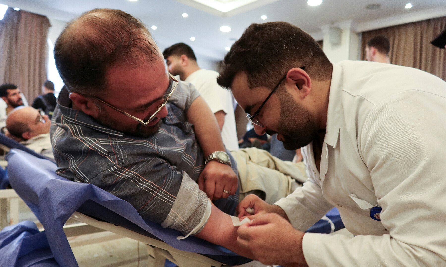 A man donates blood during a blood donation campaign for Palestinians in Gaza, in Amman, Jordan June 28, 2024.&mdash;Reuters