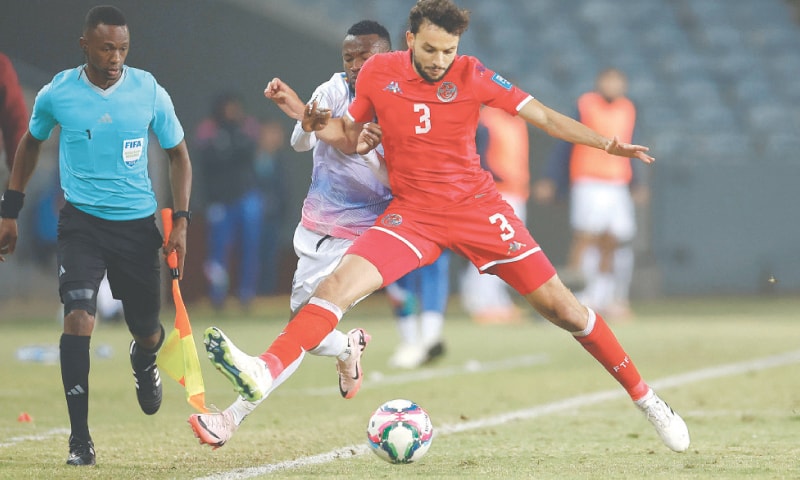SOWETO: Namibia&rsquo;s Erastus Kulula (C) vies for the ball with Montassar Talbi of Tunisia during their 2026 FIFA World Cup Group H qualifier at Orlando Stadium.&mdash;AFP