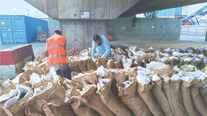 The seized resin consignment is being examined at the port.—Dawn