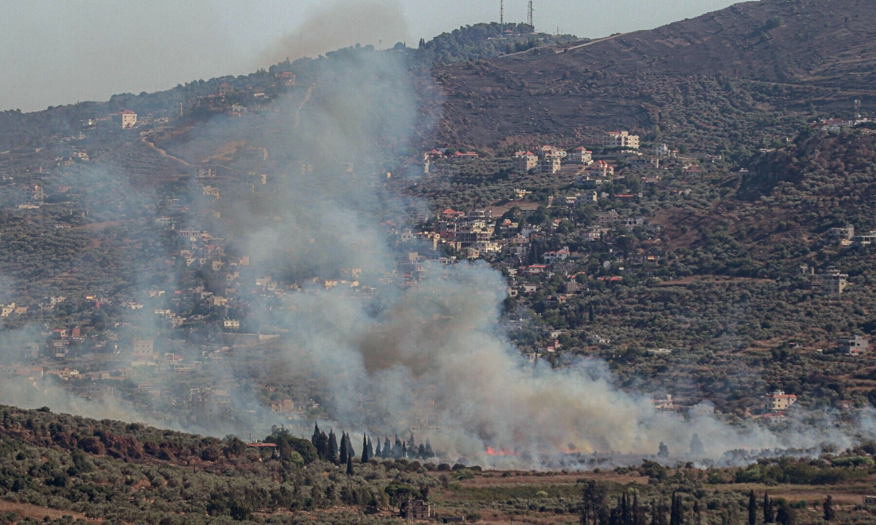 Smoke billows from a site targeted by the Israeli military in the southern Lebanese border village of Kafr Kila on July 29, 2024. — AFP