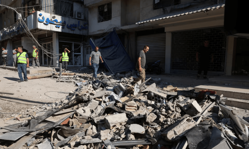  People walk on the rubble of a damaged site the day after an Israeli strike, in Beirut&rsquo;s southern suburbs, Lebanon on July 31, 2024. &mdash; Reuters 
