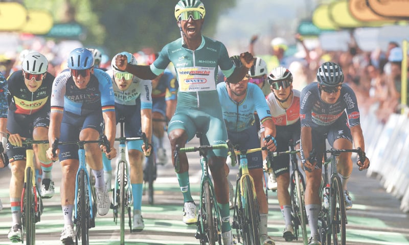 INTERMARCHE-WANTY team&rsquo;s Eritrean rider Biniam Girmay celebrates after crossing the finish line to win the 12th stage of the Tour de France, a 203.6km distance from Aurillac to Villeneuve-sur-Lot, on Thursday.&mdash;Reutersc