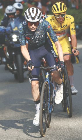 TEAM Visma-Lease a Bike’s Danish rider Jonas Vingegaard cycles ahead of UAE Team Emirates’ Tadej Pogacar of Slovenia, wearing the overall leader’s yellow jersey, during the final ascent of the Col de la Couillole during the 20th stage of the Tour de France on Saturday.—AFP