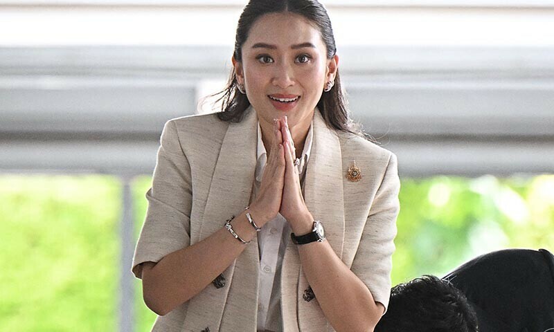 TOPSHOT - Pheu Thai party leader Paetongtarn Shinawatra, known by her nickname “Ung Ing” and daughter of former prime minister Thaksin Shinawatra, greets members of the media at local news outlet Voice TV in Bangkok on August 16, 2024. — AFP TOPSHOT - Pheu Thai party leader Paetongtarn Shinawatra, known by her nickname “Ung Ing” and daughter of former prime minister Thaksin Shinawatra, greets members of the media at local news outlet Voice TV in Bangkok on August 16, 2024. — AFP